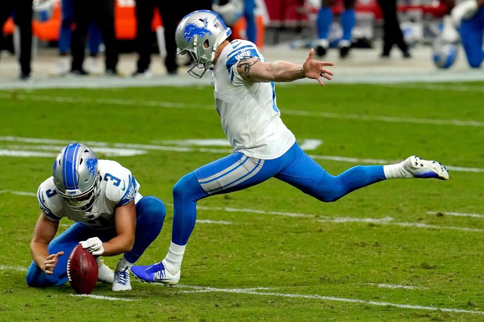 Lions kicker Matt Prater kicks the field goal as punter Jack Fox holds during the second half of the Lions' 26-23 win on Sunday, Sept. 27, 2020, in Glendale, Ariz.