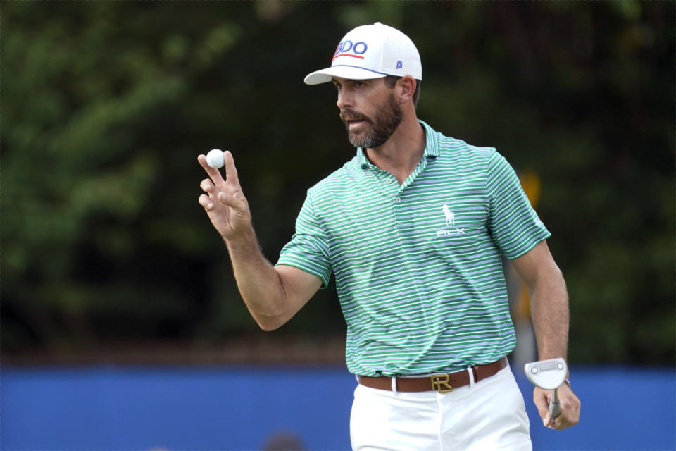 Billy Horschel reacts after making a birdie putt on the 17th hole during the second round of the Wyndham Championship golf tournament in Greensboro, N.C., Friday, Aug. 4, 2023. (AP Photo/Chuck Burton)