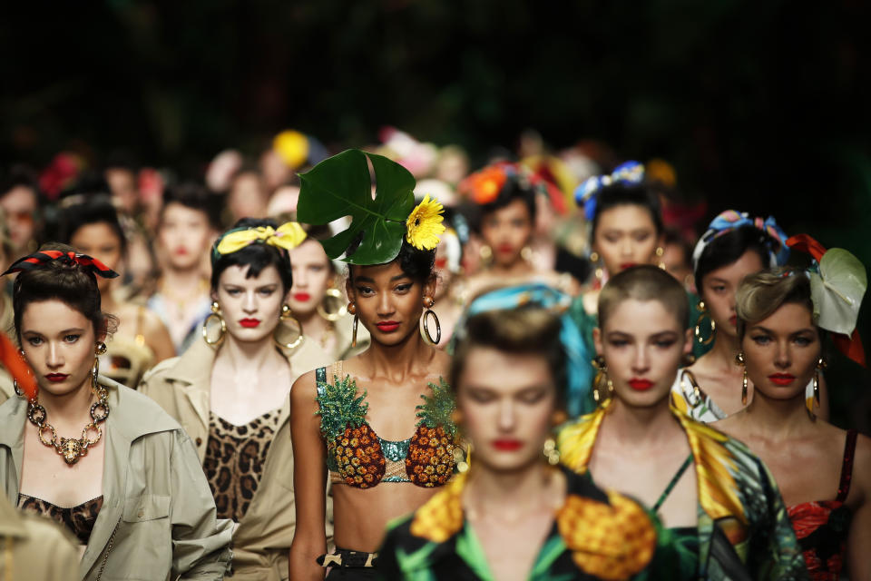 Models wear creations as part of the Dolce & Gabbana Spring-Summer 2020 collection, unveiled during the fashion week, in Milan, Italy, Sunday, Sept. 22, 2019. (AP Photo/Antonio Calanni)