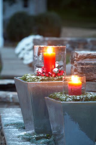 14 Holiday Planter Ideas That Will Give Guests a Warm Welcome