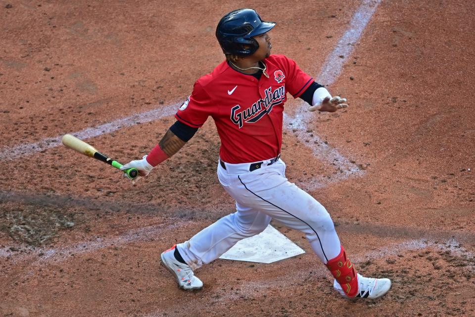 Cleveland Guardians' Jose Ramirez watches his two-run home run off Kansas City Royals starting pitcher Jonathan Heasley in the fifth inning of a baseball game, Monday, May 30, 2022, in Cleveland. (AP Photo/David Dermer)