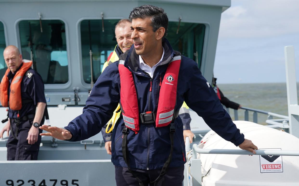 Rishi Sunak, the Prime Minister, is pictured on June 5 last year onboard the Border Force cutter HMC Seeker