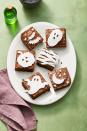 <p>Need a last-minute dessert for your Halloween party? Decorate brownies (homemade or store-bought!) with cut-out white fondant.</p><p><strong>RELATED: </strong><a href="https://www.goodhousekeeping.com/holidays/halloween-ideas/g565/halloween-party-ideas/" rel="nofollow noopener" target="_blank" data-ylk="slk:95 Scary-Good Halloween Party Ideas to Guarantee a Good Time;elm:context_link;itc:0;sec:content-canvas" class="link ">95 Scary-Good Halloween Party Ideas to Guarantee a Good Time</a></p>