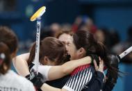 Curling - Pyeongchang 2018 Winter Olympics - Women's Semi-final - South Korea v Japan - Gangneung Curling Center - Gangneung, South Korea - February 23, 2018 - South Korea players celebrate after winning. REUTERS/John Sibley