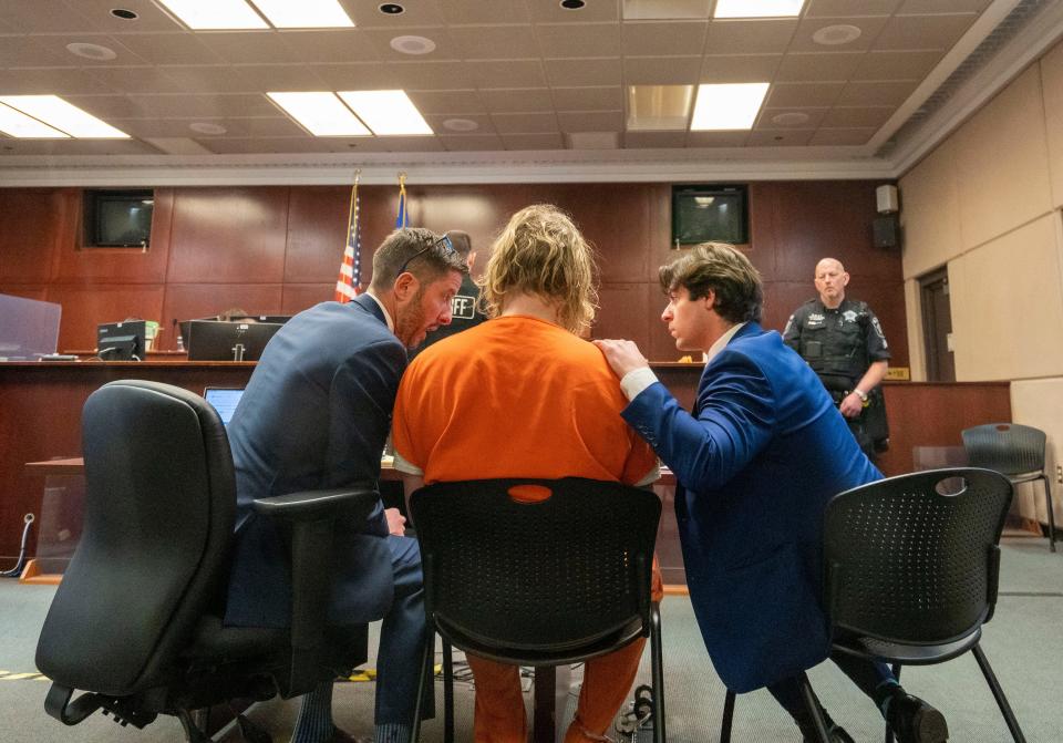 Maxwell Anderson talks to his lawyers as he's charged with killing and dismembering 19-year-old Sade Carleena Robinson on Friday, April 12, 2024, at the Milwaukee County Criminal Justice Facility in Milwaukee.