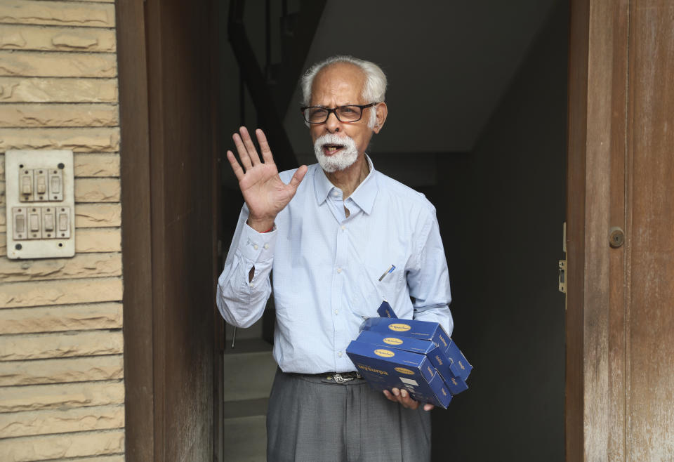 FILE - In this Nov. 8, 2020, file photo, Vice President Kamala Harris' maternal uncle, Balachandran Gopalan, talks to media outside his house, in New Delhi, India. (AP Photo/Manish Swarup, File)