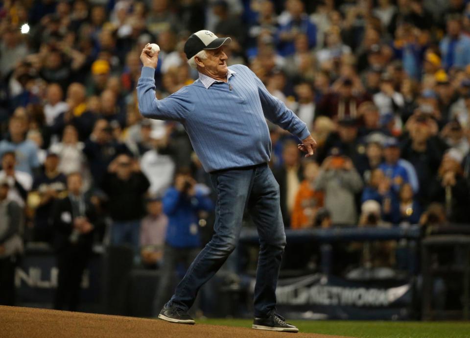 Bob Uecker throws out a ceremonial first pitch before Game 1 of the 2018 NLCS between the Milwaukee Brewers and the Los Angeles Dodgers at Miller Park.