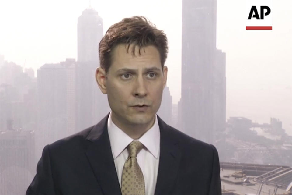 In this image made from a video taken on March 28, 2018, Michael Kovrig, an adviser with the International Crisis Group, a Brussels-based non-governmental organization, speaks during an interview in Hong Kong. Canadian Public Safety Minister Ralph Goodale confirmed on Tuesday, Dec. 11, 2018, that Kovrig, a former Canadian diplomat, was arrested Monday night in Beijing, China. The arrest comes amid a dispute between the two counties over Canada's arrest of a Chinese executive at the request of the United States. (AP Photo)