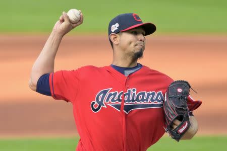 FILE PHOTO: Apr 23, 2019; Cleveland, OH, USA; Cleveland Indians starting pitcher Carlos Carrasco (59) throws against the Miami Marlins in the third inning at Progressive Field. Mandatory Credit: David Richard-USA TODAY Sports