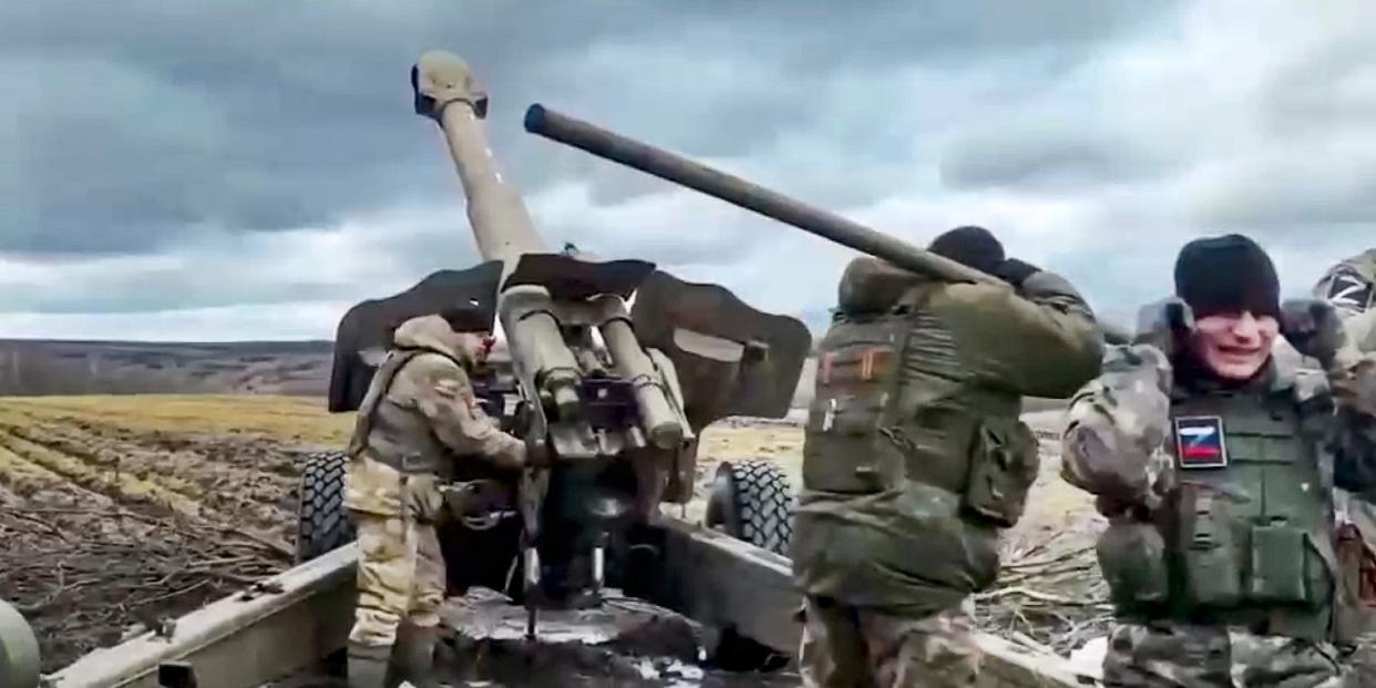 In this handout photo taken from video and released by Russian Defense Ministry Press Service on Wednesday, March 22, 2023, a Russian army's howitzer fires at Ukrainian troops at an undisclosed location.