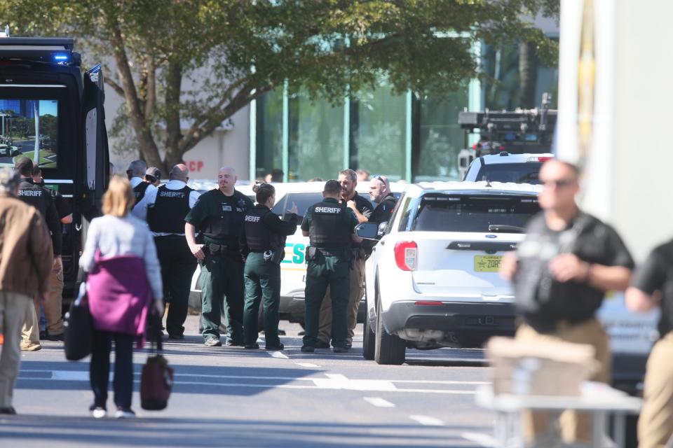 A huge number of law enforcement was on hand at a hostage situation at the Bank of America building at Bell Tower Shops. A suspect was killed by a member of the SWAT Team on Tuesday, Feb. 6, 2024. There were no injuries to the hostages and law enforcement. (Andrew West/The News-Press a part of the USA Today Network)