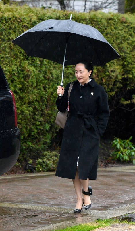 Huawei Chief Financial Officer Meng Wanzhou leaves her home to attend her extradition hearing in Vancouver