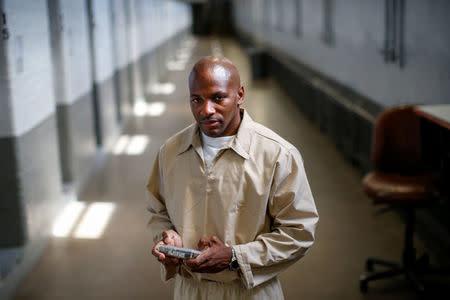 Inmate Marvin Worthy poses while using his JPay tablet device inside the East Jersey State Prison in Rahway, New Jersey, U.S., July 12, 2018. REUTERS/Brendan McDermid