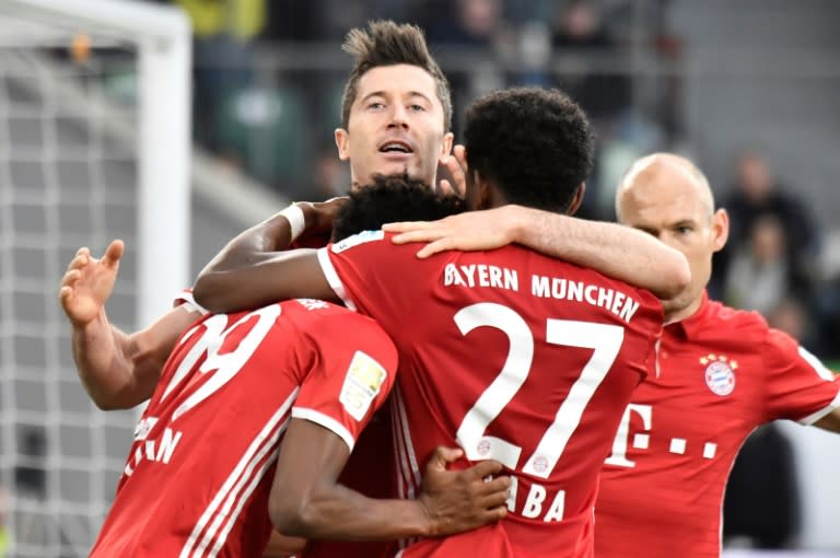 Bayern Munich celebrates after scoring during their German first division Bundesliga football match against Wolfsburg on April 29, 2017 in Wolfsburg, northern Germany