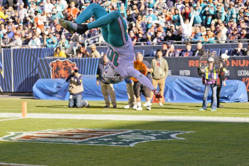 Miami Dolphins wide receiver Tyreek Hill celebrates a touch down during the first half of an NFL football game against the Chicago Bears, Sunday, Nov. 6, 2022 in Chicago. (AP Photo/Charles Rex Arbogast)