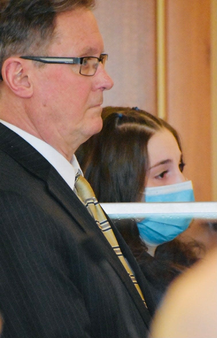 Attorney Michael Hussey and Jaclyn Marie Coleman listen during the hearing in Fall River Superior Court Friday, March 24.