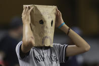 A fan reacts as he watches during the bottom of the ninth inning as the Toronto Blue Jays take on the New York Yankees in a baseball game Thursday, Aug. 18, 2022, in New York. (AP Photo/Adam Hunger)