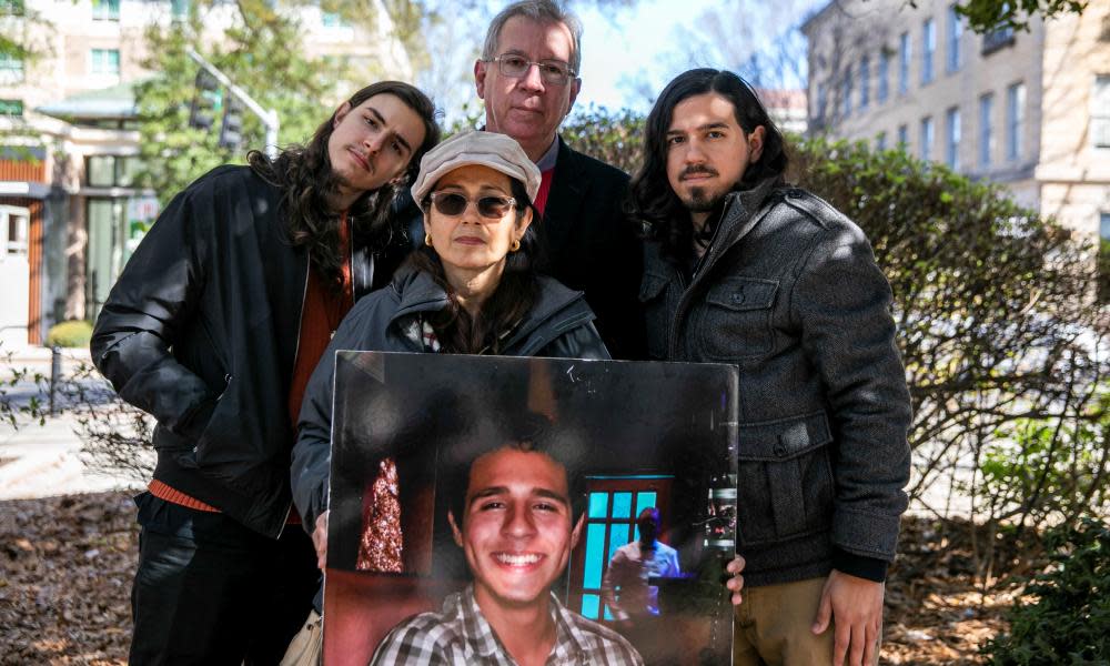 four people holding photo of Manuel Paez Terán