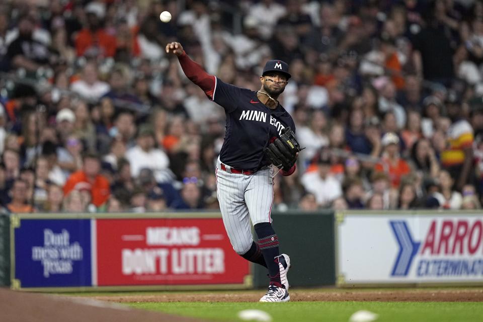 Minnesota Twins third baseman Willi Castro throws to first for the out after fielding a ground ball by Houston Astros' Chas McCormick during the fifth inning of a baseball game Wednesday, May 31, 2023, in Houston. (AP Photo/David J. Phillip)