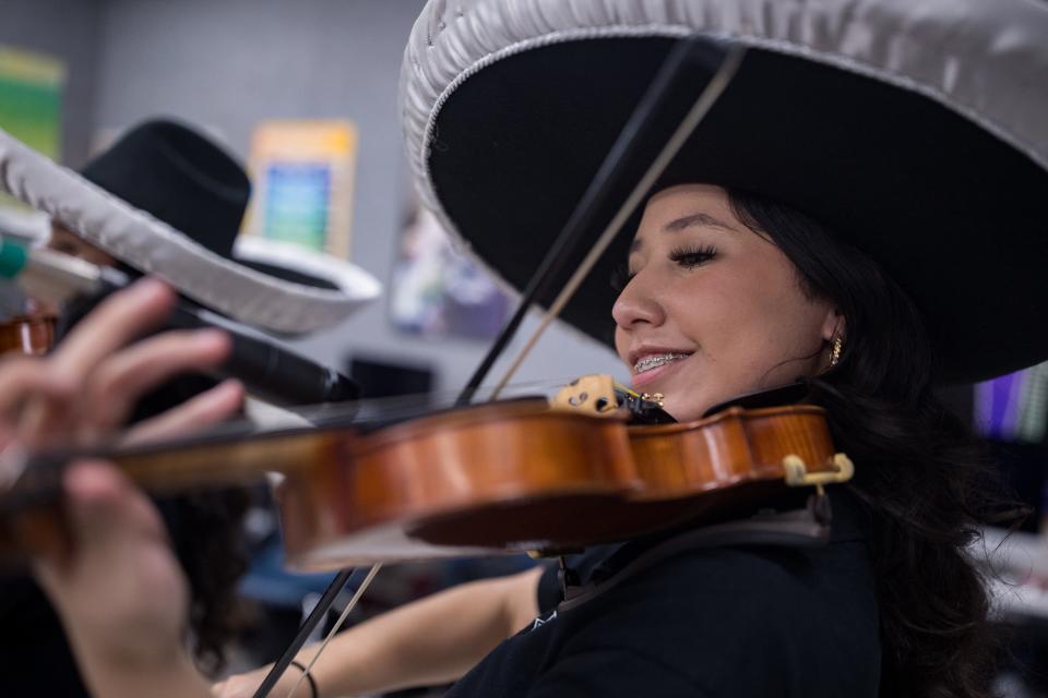 Anais Santos, a student at Franklin High School, plays the violin at rehearsal on Friday, Feb. 9, 2024. Mariachi Estrella Del Oeste is one of the four El Paso Independent School District high schools that have secured spots in the 2024 UIL State Mariachi Festival.