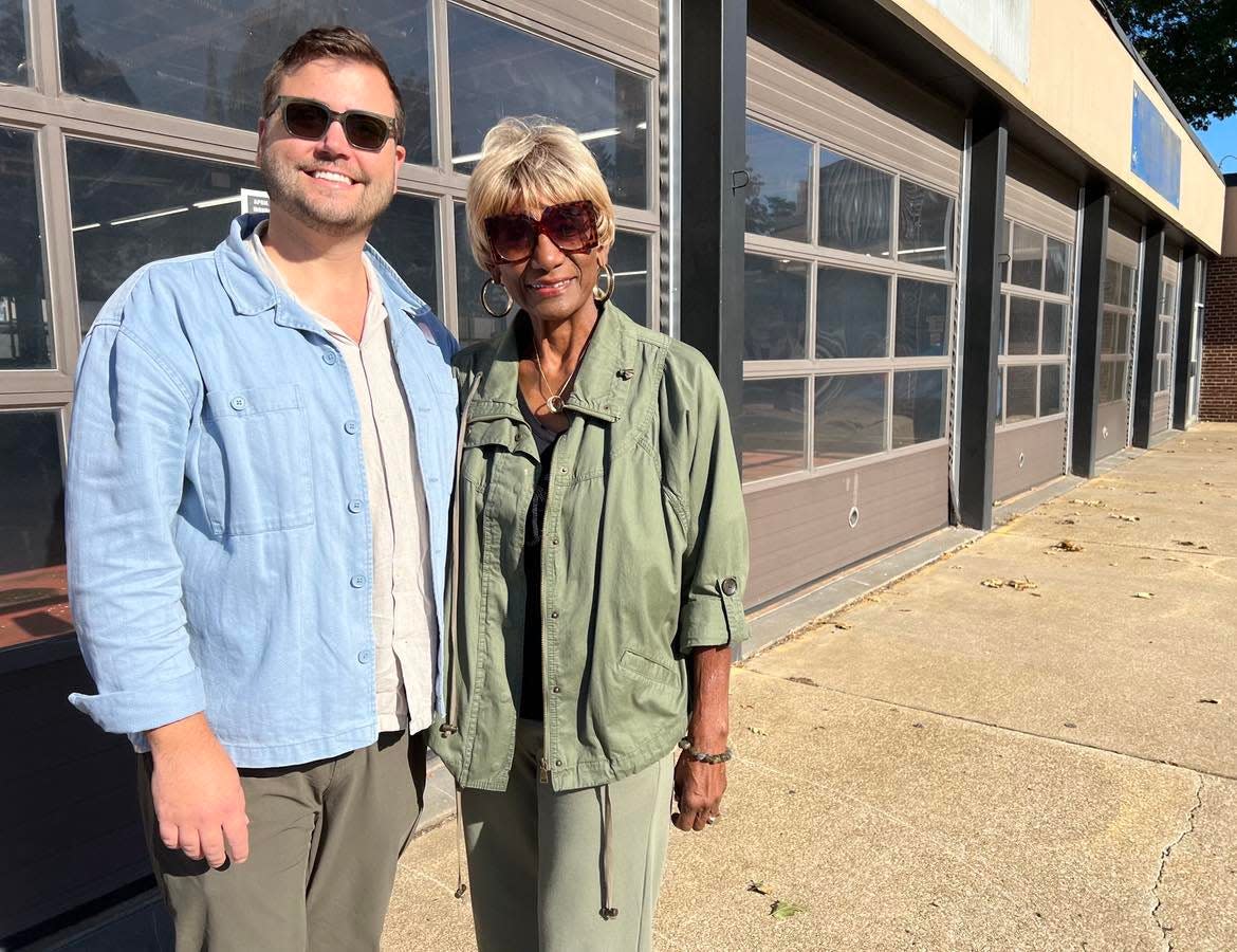Mike Scott, CEO of the Stark County-based Bluecoats, and Betty Smith, executive director of EN-RICH-MENT Fine Arts Academy in Canton, are shown outside the former Ziegler Tire building in downtown Canton. The building is being considered as a permanent home for EN-RICH-MENT.