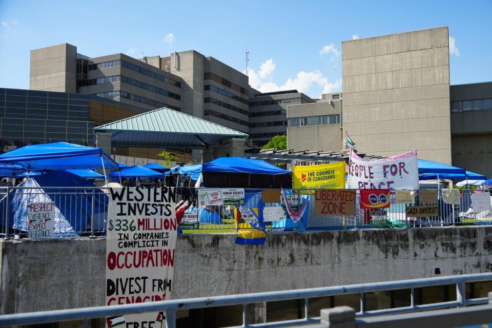 Occupiers of the concrete beach, a picnic area outside Western University's student community centre building, has grown to include more than two-dozen tents. 