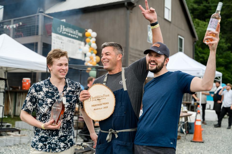 In 2022, Chef Owen McGlynn (center), co-owner of Asheville Proper and Little D's, and his culinary team won Heritage Fire's Heritage Hero award for their steak and chimichurri dish.