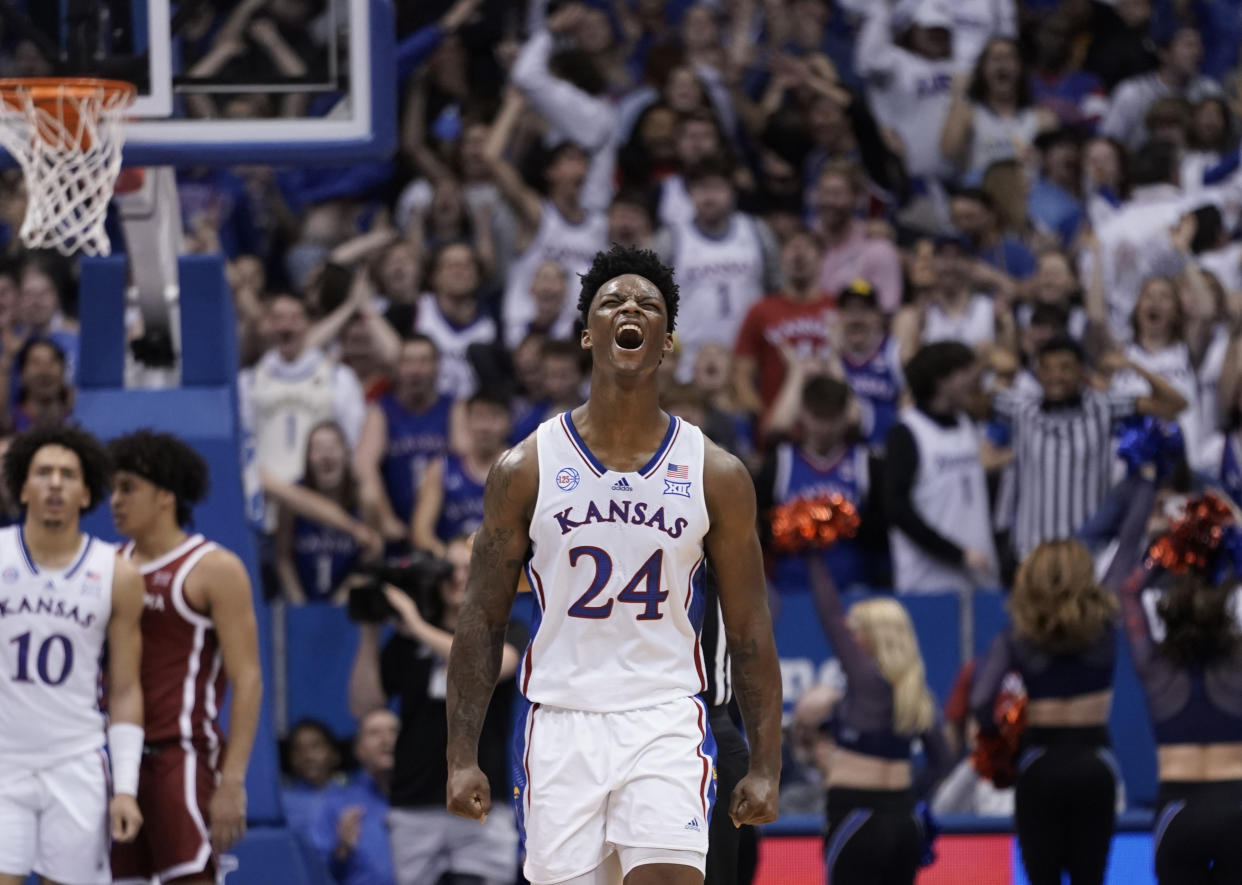 Jayhawks forward K.J. Adams during a game last season. (Ed Zurga/Getty Images)