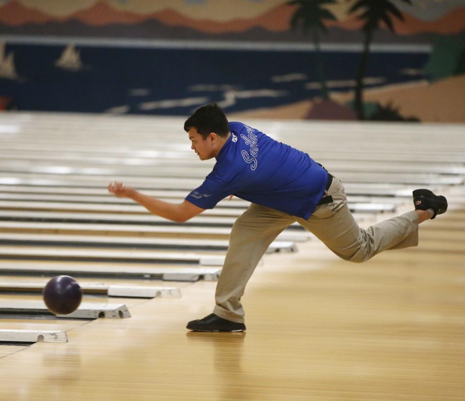 Hendrick Hudson's Ethan Bromley bowls during the Section 1 bowling championships in Fishkill on February 14, 2023.