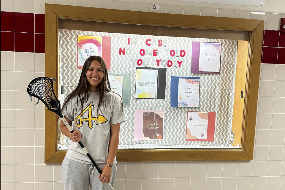 Student Marijah Skye, 17 years old, poses at Salamanca High School in Salamanca, N.Y. on April 18, 2023. Marijah and other Native American students favor keeping the school's logo, which features the profile of a Native American man, despite the state's ban on the use of Indigenous names, mascots and logos by public schools. The school is located on Seneca Nation of Indians territory. (AP Photo/Carolyn Thompson)