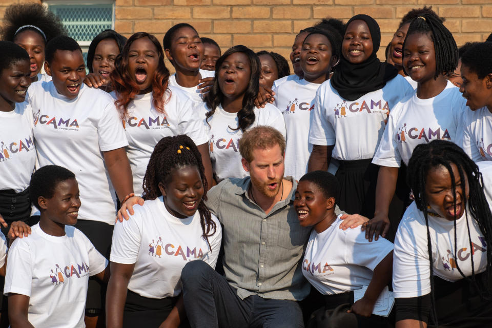 The Duke of Sussex sings with the CAMA choir during a visit to the Nalikule College of Education in Lilongwe, Malawi, to see the work of the CAMA network supporting young women in Malawi.