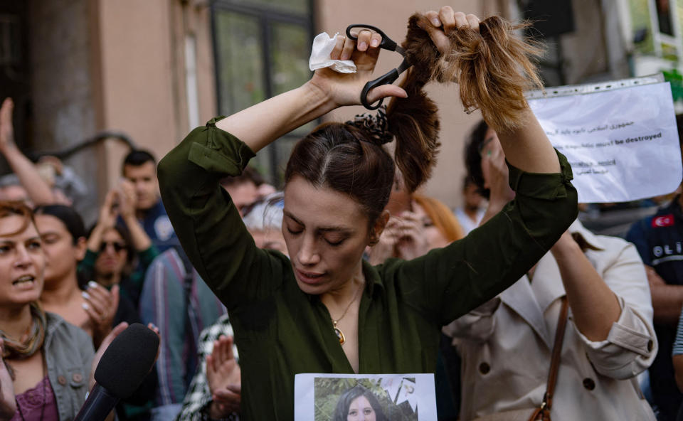 Iran women protest (Yasin Akgul / AFP via Getty Images)