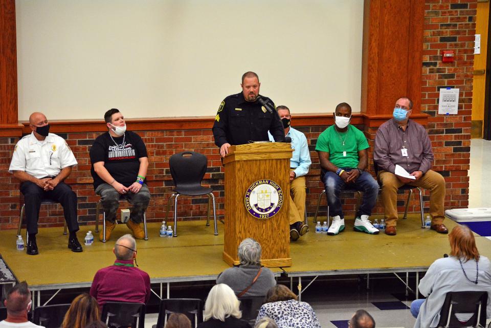 Columbia Police Sgt. Dallas Dollens speaks at an October 2021 emergency community meeting on opioids at Hickman High School.