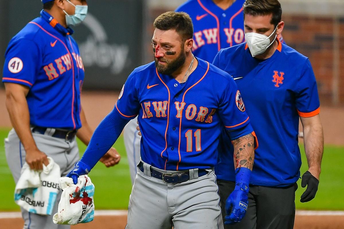 ATLANTA, GA – JUNE 29: New York center fielder Kevin Pillar (11) wears a  mask in the field during the MLB game between the New York Mets and the  Atlanta Braves on