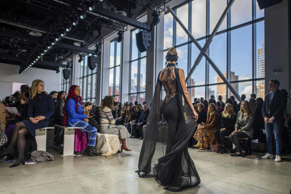 The Badgley Mischka collection is modeled at Spring Studios during NYFW Fall/Winter 2020 on Saturday, Feb. 8, 2020, in New York. (Photo by Charles Sykes/Invision/AP)