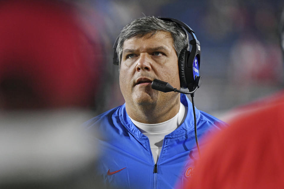 FILE - Mississippi head coach Matt Luke watches on during the second half of an NCAA college football game against LSU in Oxford, Miss., Saturday, Nov. 16, 2019. Luke is back on the sidelines as an offensive line coach at Clemson. He was hired earlier this month and was immediately hit the field as the Tigers prepare to play Kentucky in the Gator Bowl. (AP Photo/Thomas Graning, FIle)