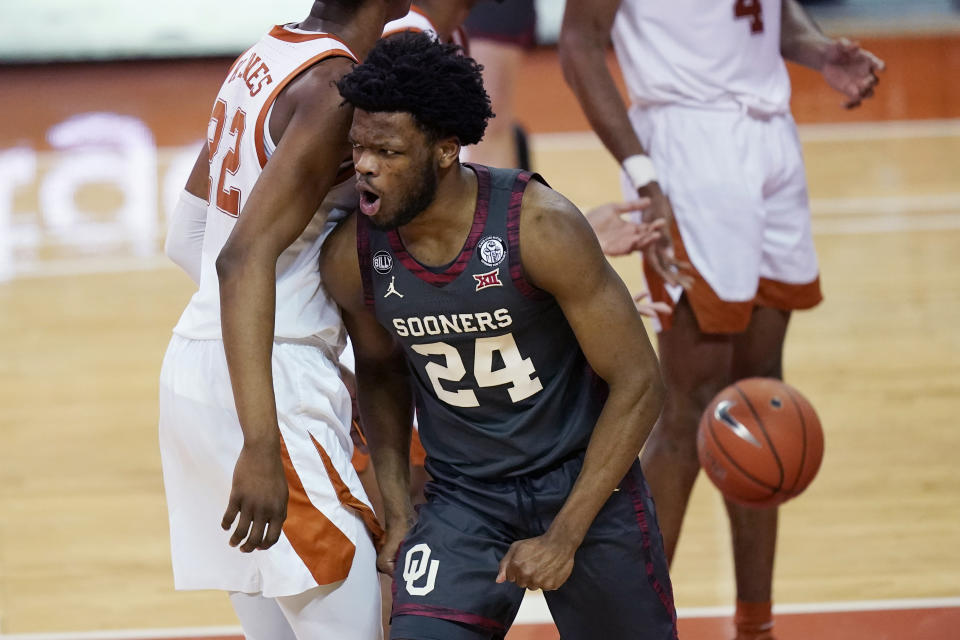 Oklahoma guard Elijah Harkless (24) reacts after scoring against Texas during the second half of an NCAA college basketball game, Tuesday, Jan. 26, 2021, in Austin, Texas. (AP Photo/Eric Gay)