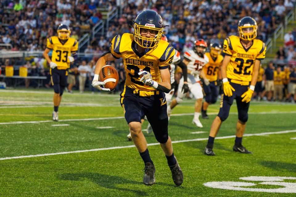 Littlestown's Colby Hahn (21) runs the ball during the first half of a football game between the Hanover Nighthawks and Littlestown Thunderbolts, Saturday, Sept. 17, 2022, in Littlestown Borough. Littlestown was ahead at the half, 42-6.