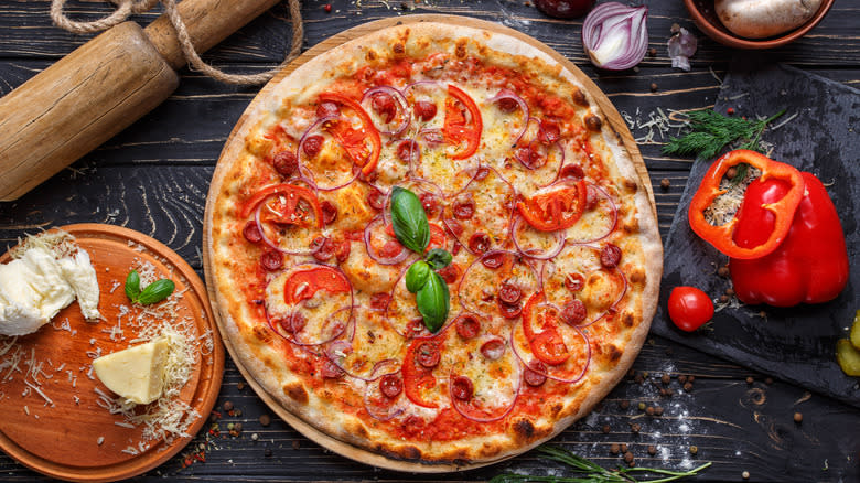 homemade pizza on rustic counter