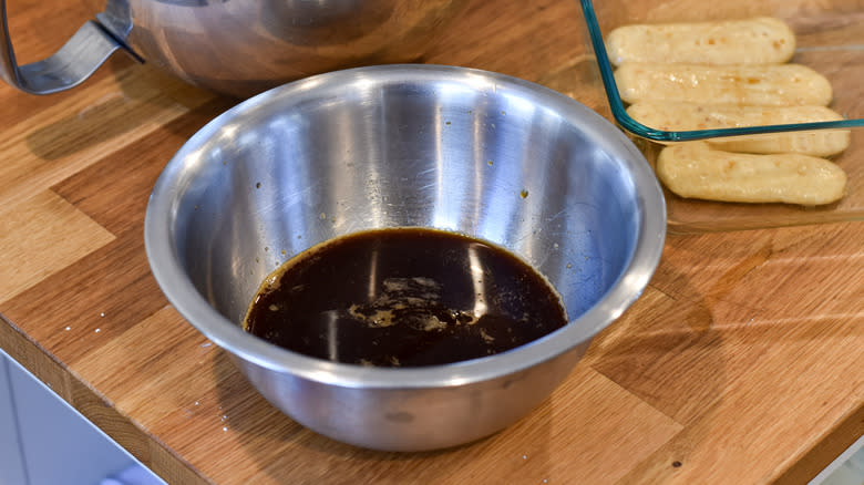 espresso dipping lady fingers tiramisu