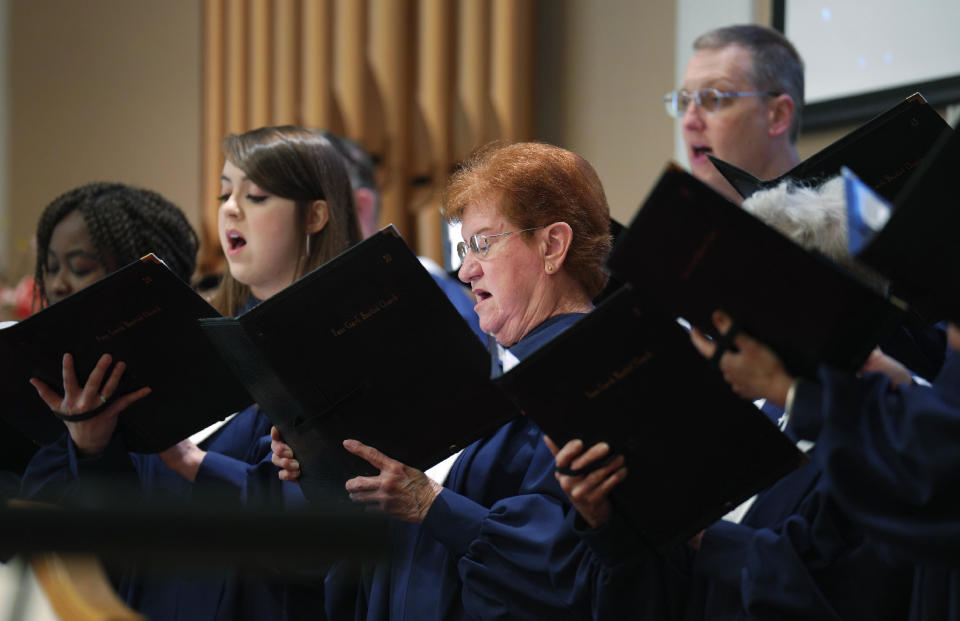 The Fern Creek Baptist Church choir sings during a service, Sunday, May 21, 2023, in Louisville, Ky. (AP Photo/Jessie Wardarski)