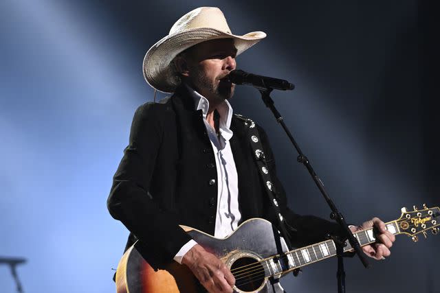 <p>Katherine Bomboy/NBC via Getty Images</p> Toby Keith performing in Nashville in September 2023