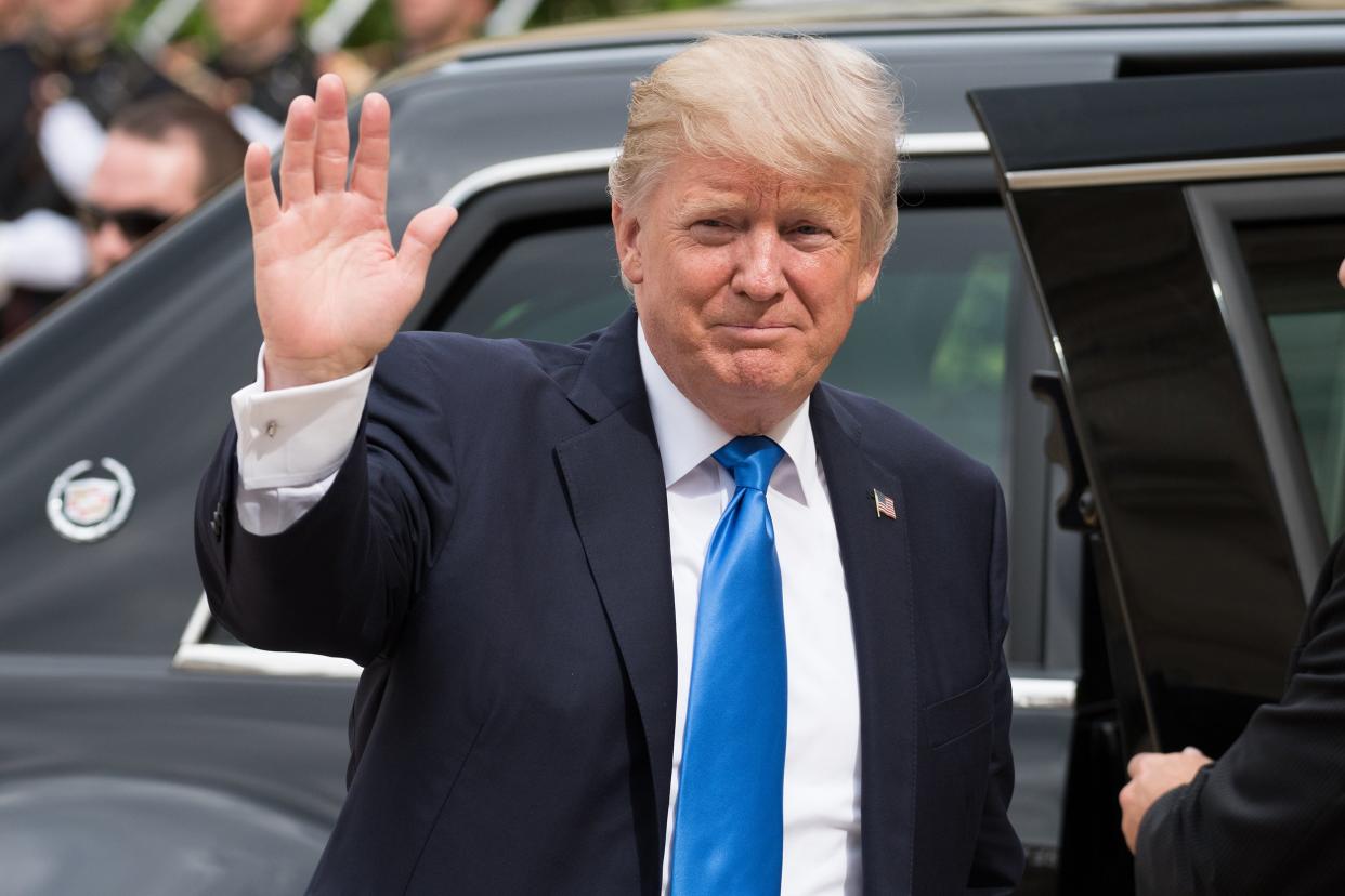 President of United States of America Donald Trump at the Elysee Palace, waving