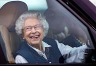 <p>Queen Elizabeth II seen driving her Range Rover car as she attends day 2 of the Royal Windsor Horse Show in Home Park, Windsor Castle on July 2, 2021 in Windsor, England.</p>