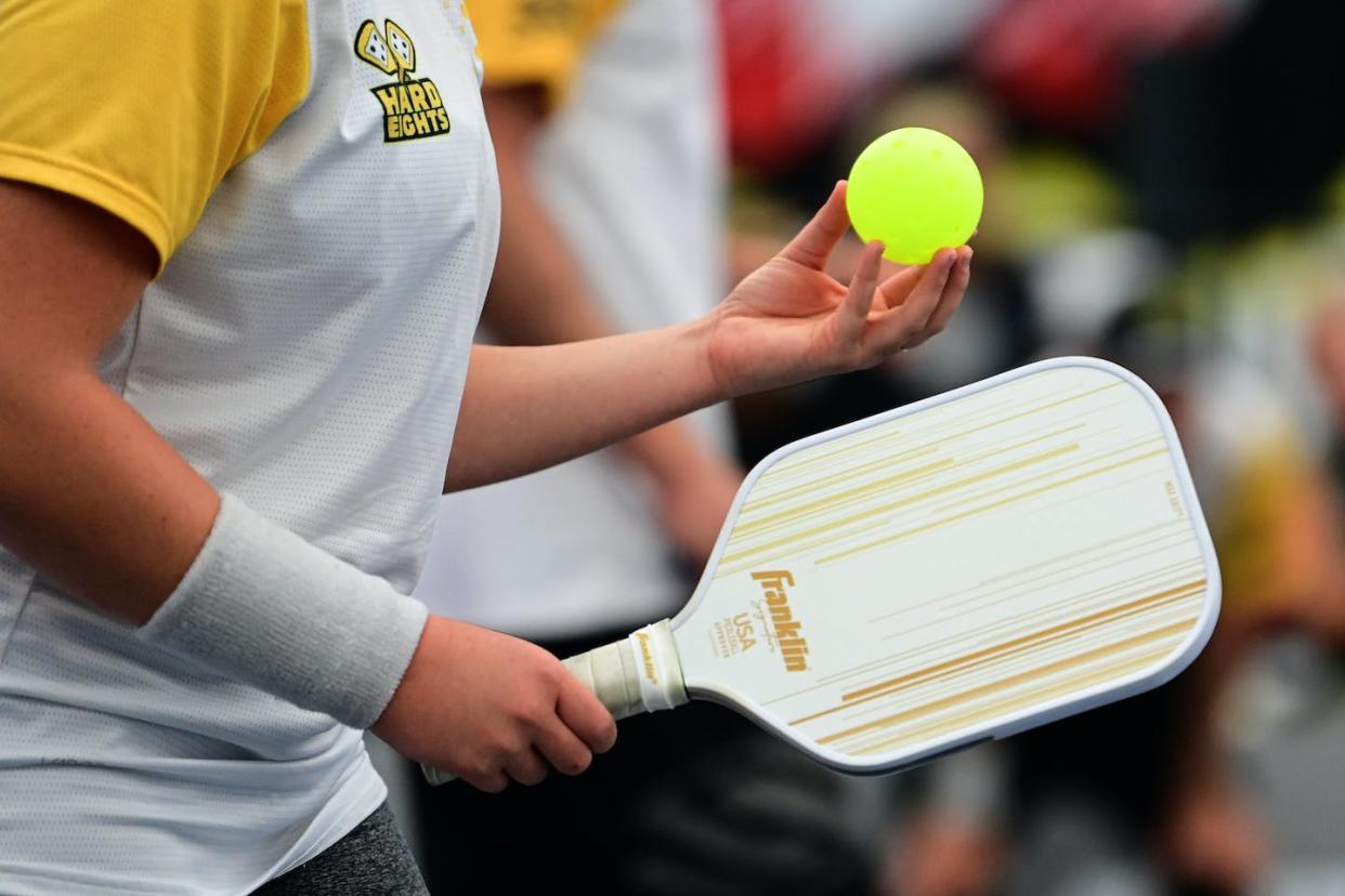 For every headline about pickleball’s miraculous growth, you can also find stories about conflicts and infighting. <a href="https://www.gettyimages.com/detail/news-photo/jorja-johnson-of-the-hard-eights-holds-her-franklin-paddle-news-photo/1434128821?phrase=pickleball&adppopup=true" rel="nofollow noopener" target="_blank" data-ylk="slk:Emilee Chinn/Getty Images;elm:context_link;itc:0;sec:content-canvas" class="link ">Emilee Chinn/Getty Images</a>