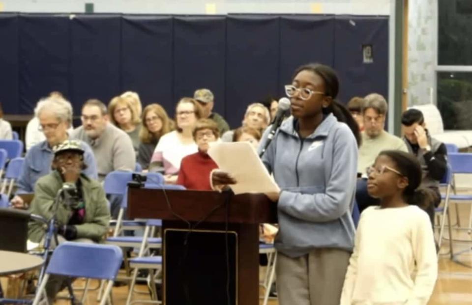 Hayden (13) and Bobbi Wilson (9) speak to local officials and residents in the town of Caldwell during a Nov. 1 mayor and council meeting. (Screenshot: YouTube – Daily Kos)