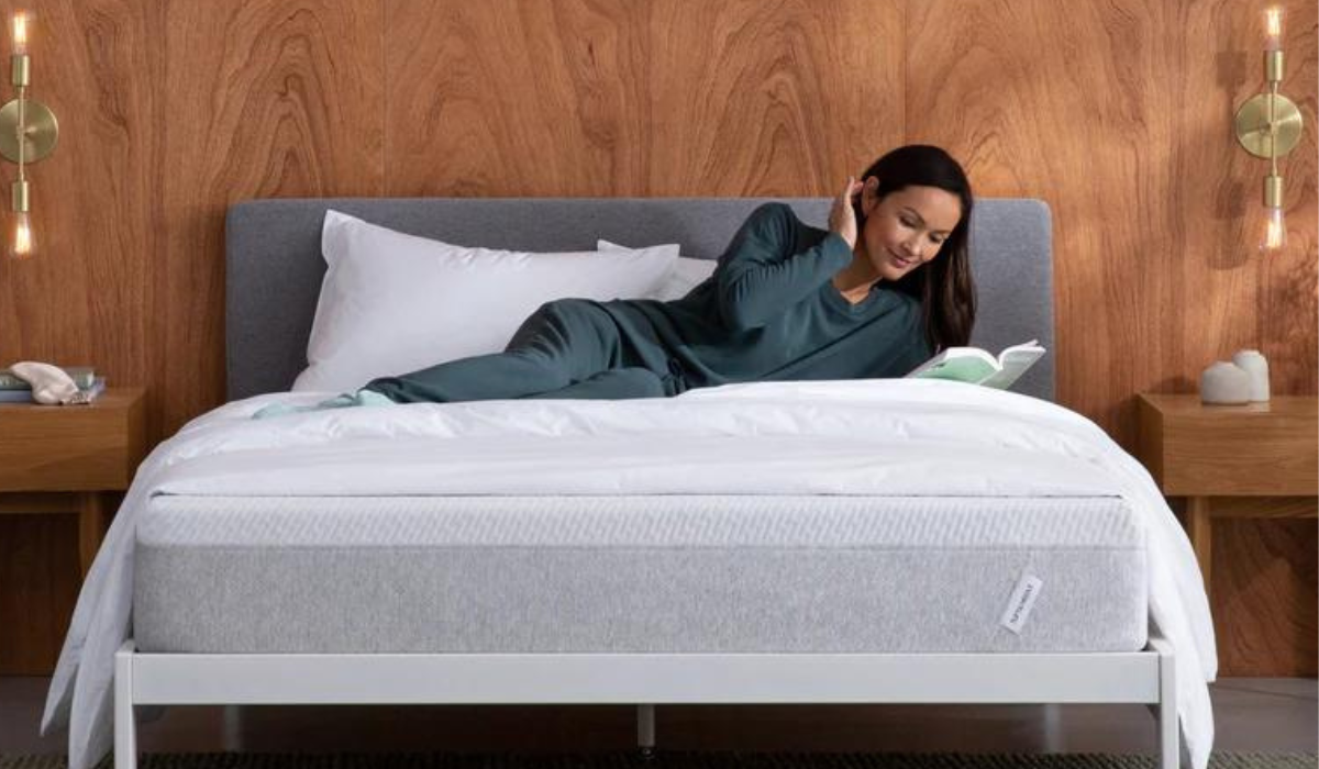 Woman laying on Tuft & Needle mattress