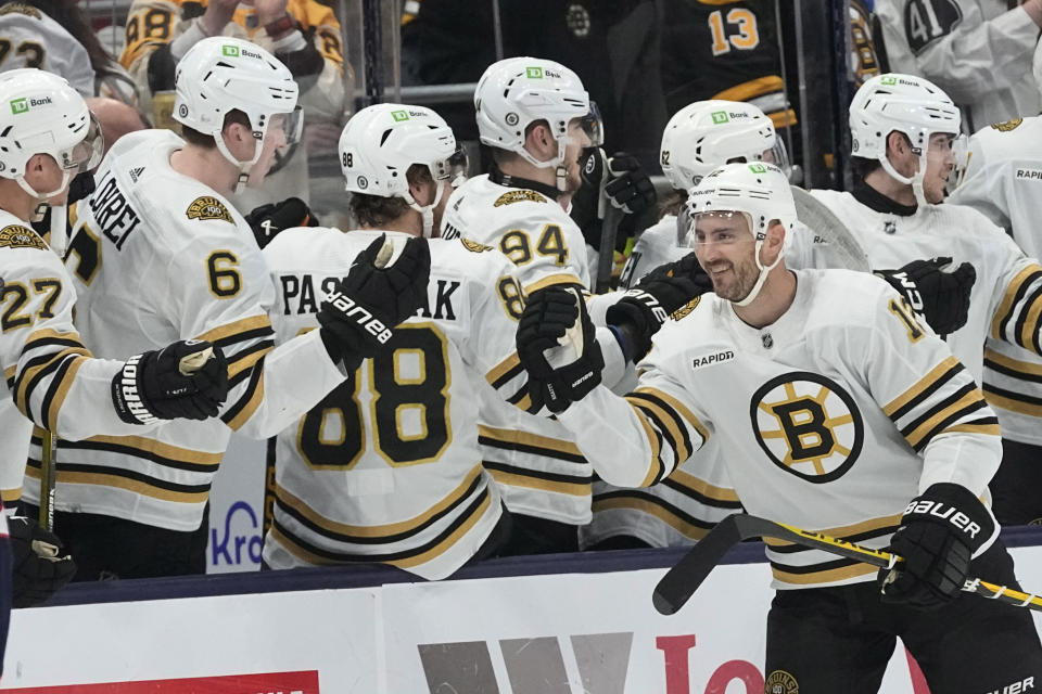 Boston Bruins defenseman Kevin Shattenkirk (12) celebrates a goal against the Columbus Blue Jackets in the second period of an NHL hockey game Tuesday, Jan. 2, 2024, in Columbus, Ohio. (AP Photo/Sue Ogrocki)