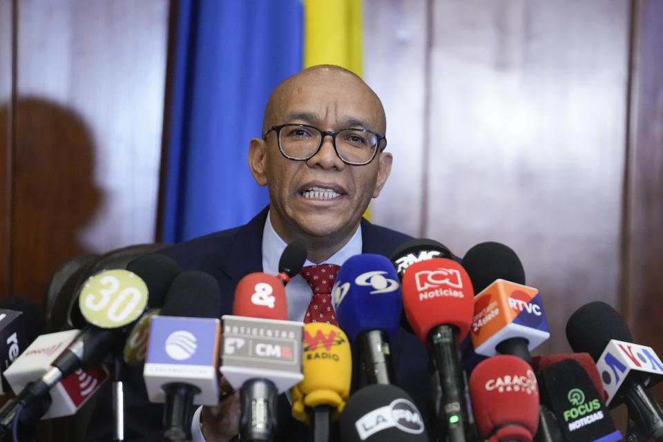Supreme Court President Gerson Chaverra gives a press conference to announce the new Attorney General in Bogota, Colombia, Tuesday, March 12, 2024. (AP Photo/Fernando Vergara)