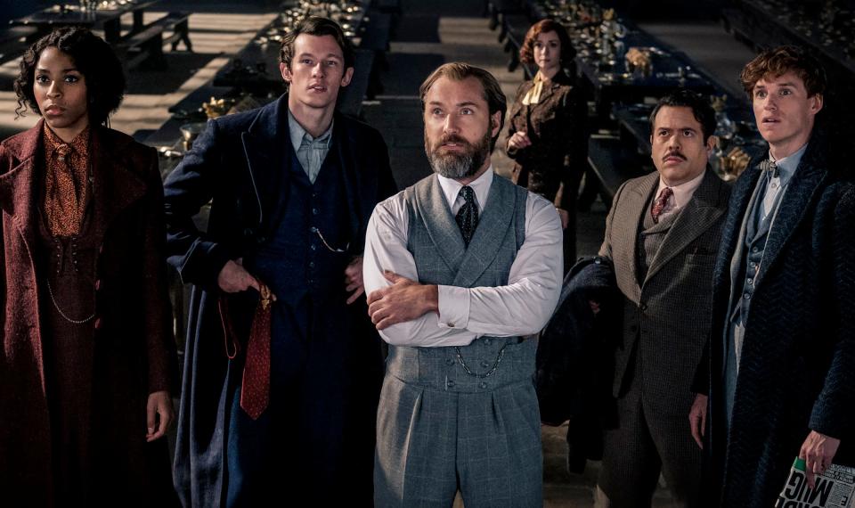 Jessica Williams, Callum Turner, Jude Law, Fionna Glascott, Dan Fogler, and Eddie Redmayne in "Fantastic Beasts: The Secrets of Dumbledore."